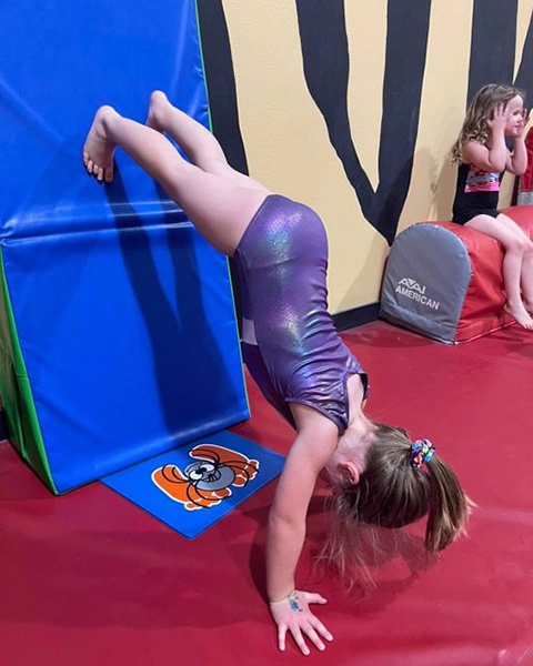 Siouxland Gymnastics Academy Girl handstand